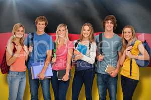 Composite image of smiling students all geared up for college