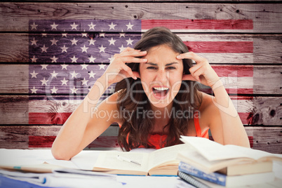 Composite image of student goes crazy doing her homework