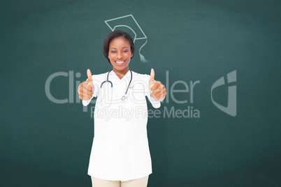 Composite image of young nurse giving thumbs up