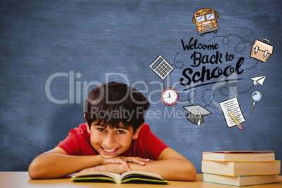 Composite image of portrait of boy reading book in library