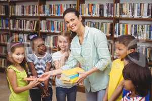 Pupils and teacher in the library