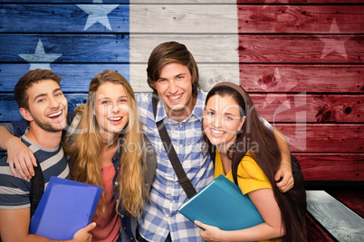 Composite image of students holding folders at college corridor