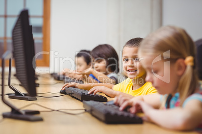 Cute pupils in computer class