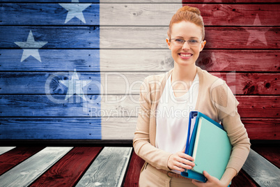 Composite image of teacher with books