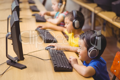 Cute pupils in computer class