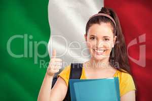 Composite image of student with thumbs up