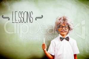 Lessons against boy dressed as senior teacher in front of blackb