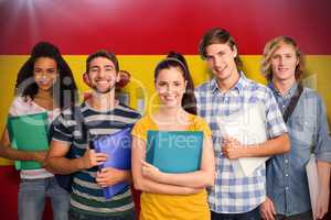 Composite image of students holding folders in college