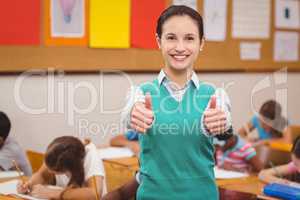 Teacher smiling at camera in classroom