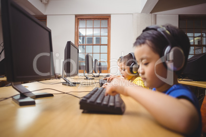 Cute pupils in computer class