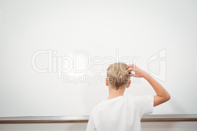 Puzzled student scratching their head