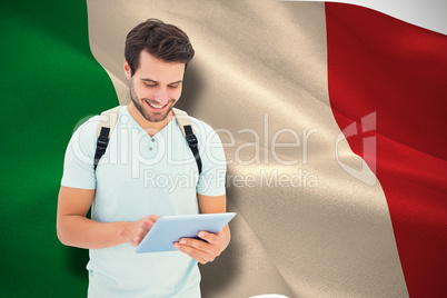 Composite image of student using tablet pc