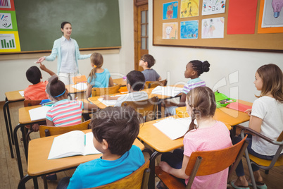 Pupils listening to teacher during class