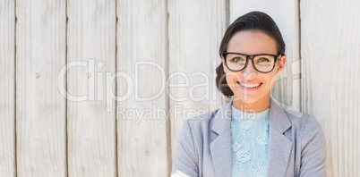 Stylish brunette thinking and smiling