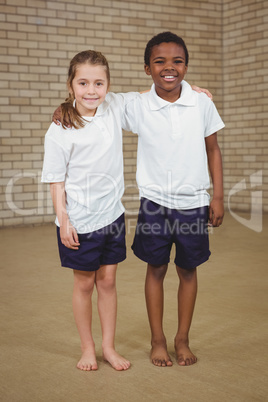 Pupils smiling with arms around each other