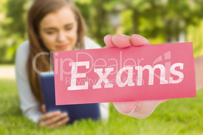 Exams against university student lying and using tablet pc
