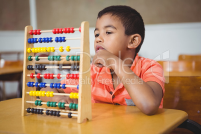 Student using a maths abacus