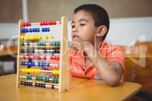 Student using a maths abacus