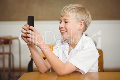 Student using a mobile phone in class