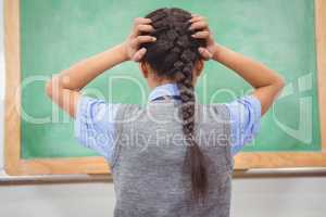 Frustrated student with hands on head