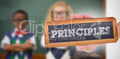 Principles against pupils smiling at camera with arms crossed