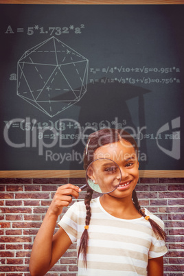 Composite image of happy pupil with magnifying glass