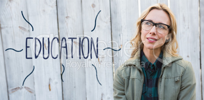 Education against blonde in glasses posing and thinking