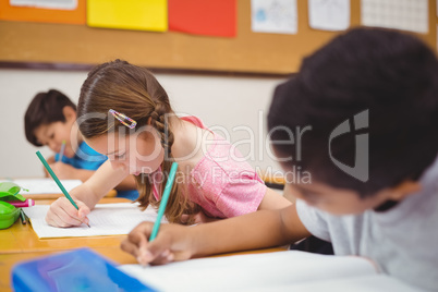 Pupil working at her desk