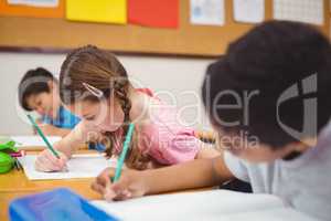 Pupil working at her desk