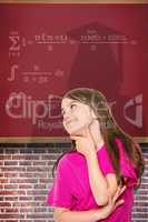 Composite image of cute little girl thinking and looking up