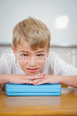 Pupil resting their head on school desk