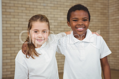 Pupils smiling with arms around each other