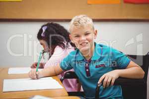 Smiling student sitting in wheelchair