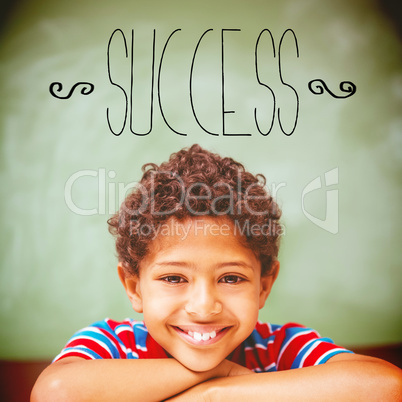 Success against little boy smiling in classroom