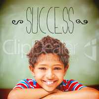 Success against little boy smiling in classroom