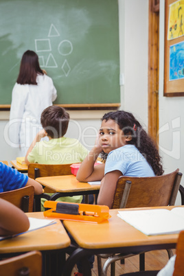 Bored student looking away from board