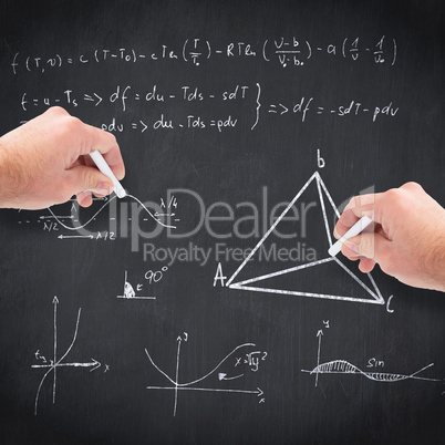 Composite image of business man writing with chalk