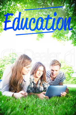 Education against happy students using tablet pc outside