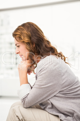 Thoughtful casual businesswoman