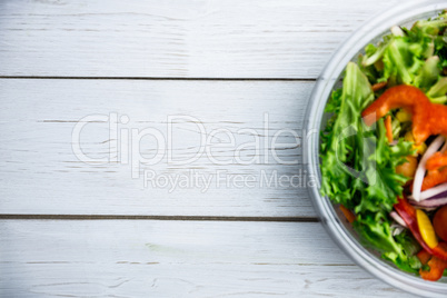 Healthy bowl of salad on table