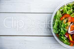 Healthy bowl of salad on table