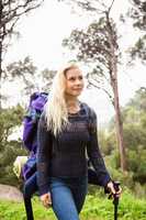 Female hiker walking with a backpack