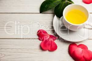 Cup of herbal tea on table