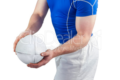 Rugby player about to throw the rugby ball