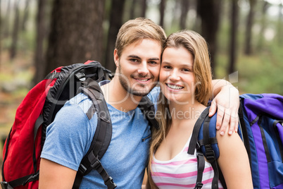 Portrait of a young happy hiker couple