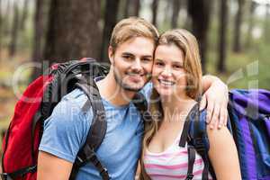 Portrait of a young happy hiker couple