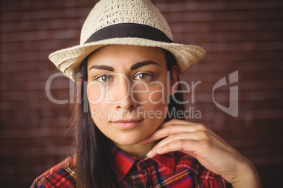 Beautiful hipster looking at camera