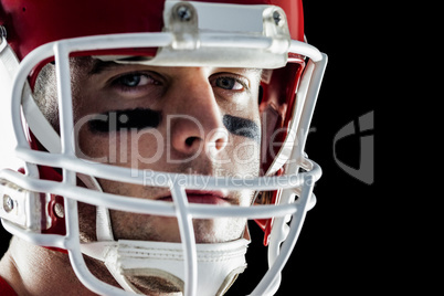 American football player looking at camera American football player looking at camera