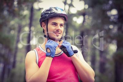 Handsome young biker looking away