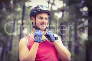 Handsome young biker looking away